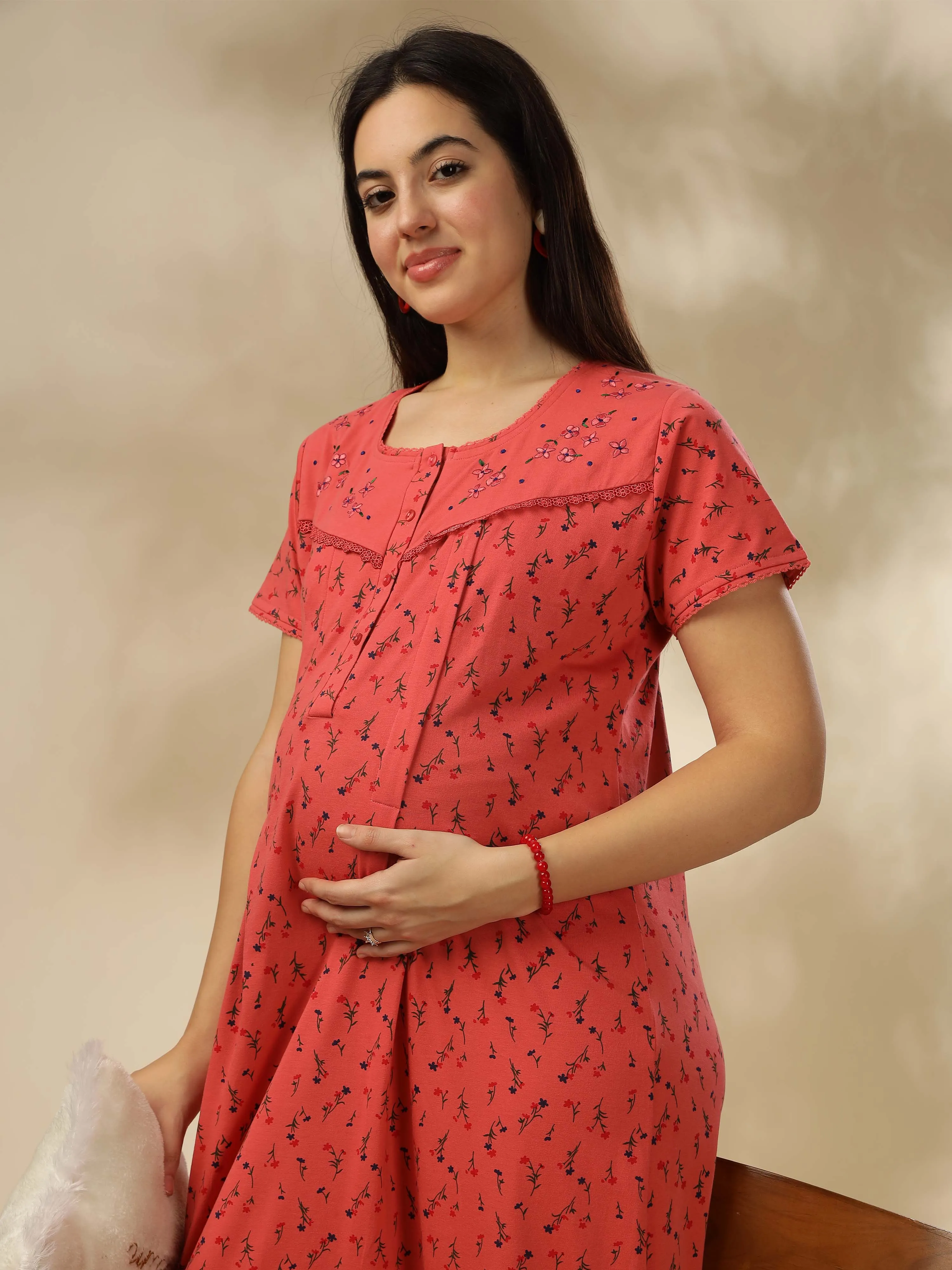 Soft and stylish, our Peachy Pink Maternity Maxi Nightdress awaits